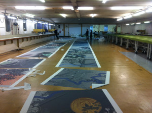 Digitally printed tensile fabric being processed for panel assmbly at Architen Landrell