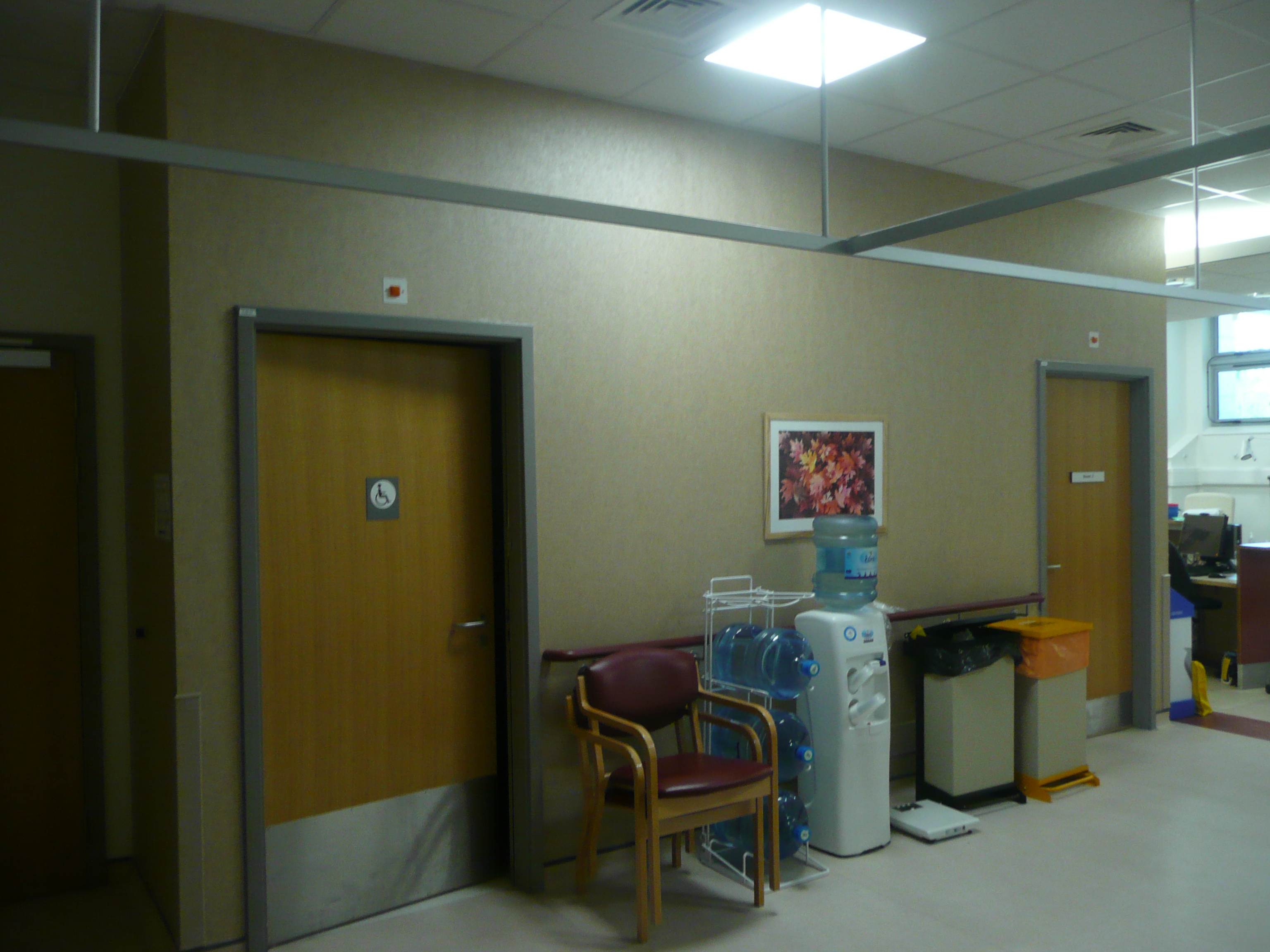 Day Treatment Unit, view from treatment areas with beds and chairs.