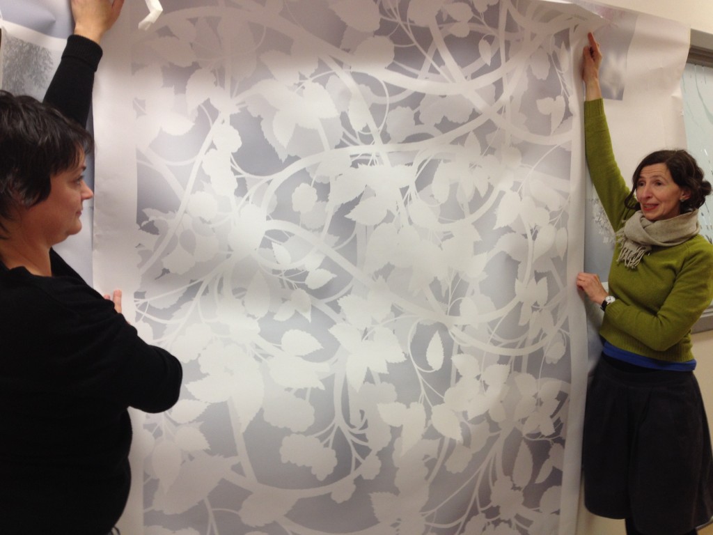 This is a full scale sample panel for an area of bespoke wall covering. VGL produced many such sample for us to approve and have been incredibly understanding and helpful in bringing the project to fruition. Ruth Charity, Arts Co-ordinator is on the right of this image & Carly Birkett, Account Manager for VGLis on the left. 