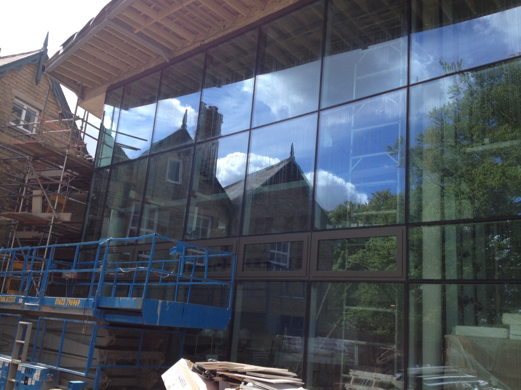 This is a part of the external East Elevation entrance, with the double height glazed curtain wall.