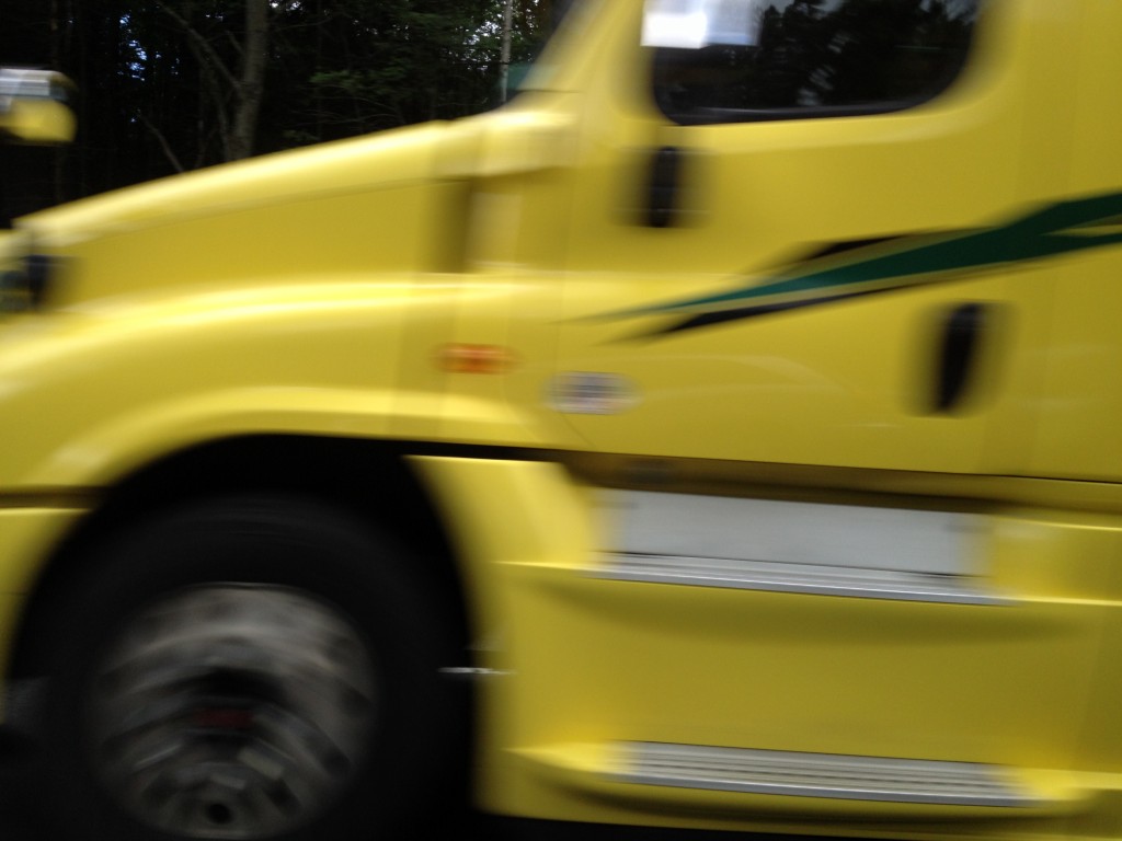 Blurred yellow truck...