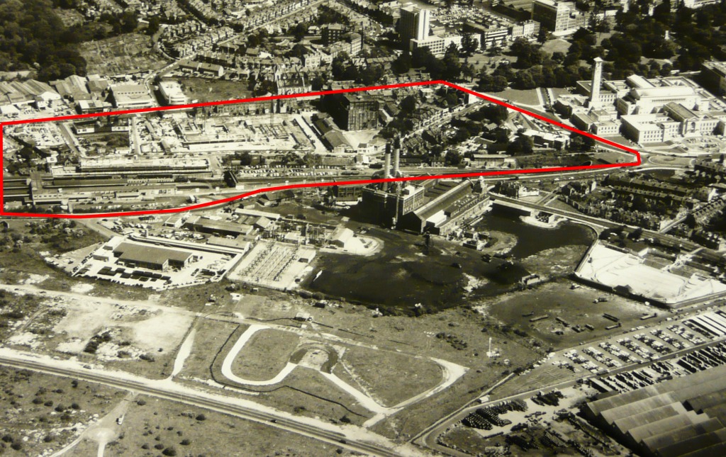 Cropped image of 1967. Looking north - this images gives a perfect west to east aerial view across the project site which is outlined in red - showing the construction of Overline House & Wyndham Court, between the railway line and Commercial Rd. The Civic Centre is at the top right hand side. SCC Local Studies and Maritime Aerial Collection.