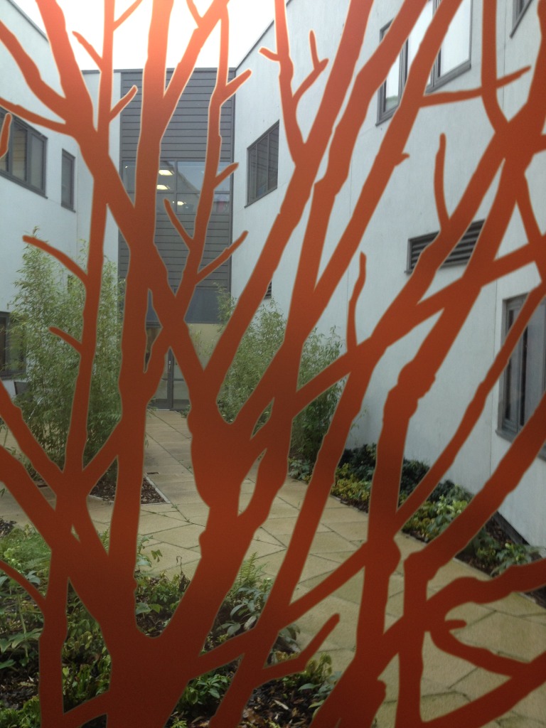 Whiteleaf Centre, Aylesbury. Detail of glazing manifestation in entrance corridor by Christopher Tipping