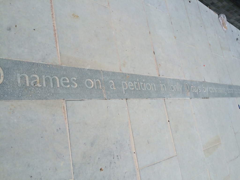 Genesis Housing Association. Detail: sandblasted granite paving, part of the embedded public art interpretation, taken during installation on site. Image: Christopher Tipping