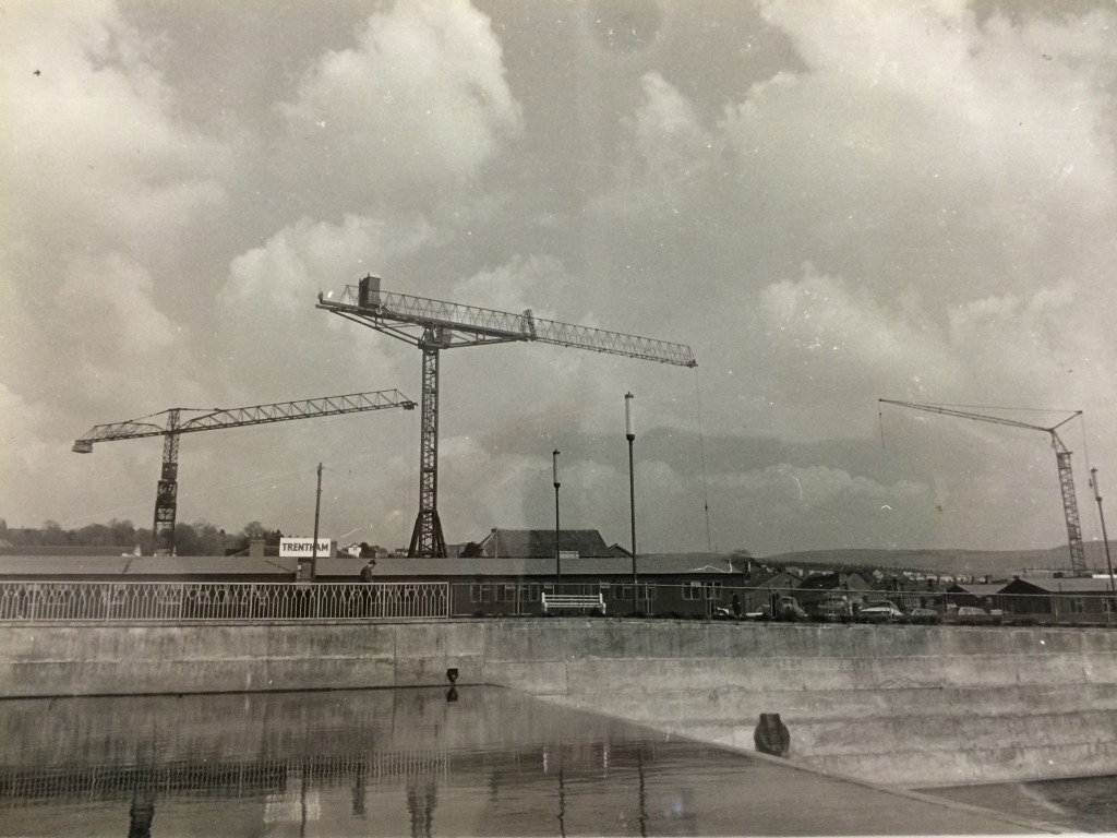 Looking North East across Merthyr Tydfil Town Centre, circa 1960's showing the cranes involved in the construction of the St Tydfil's Shopping Centre. Image: by kind permission of St Tydfil's Shopping Centre Manager. 
