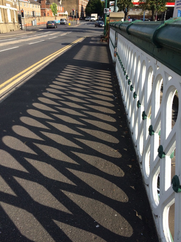 Shadows cast by the cast iron balustrade of the Viaduct over Railway Street, Chatham. Image: Christopher Tipping