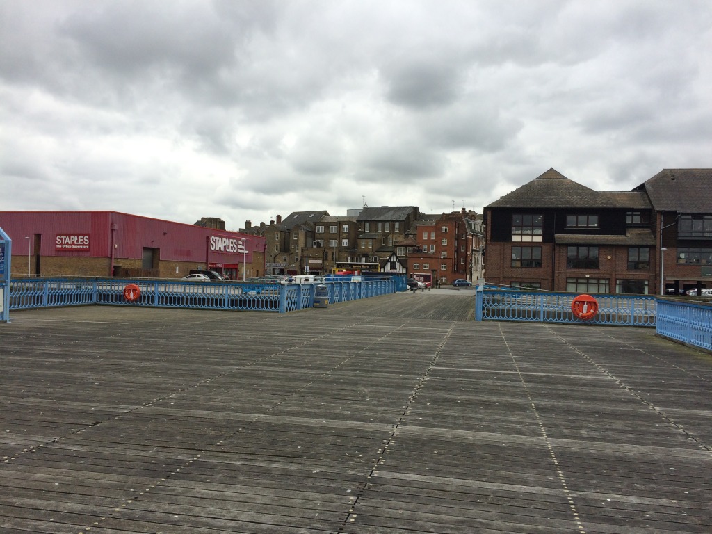 The empty timber deck of Sun Pier, Chatham. Image:Christopher Tipping