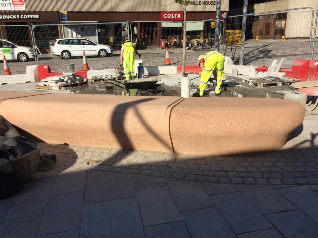 Station Quarter North, Southampton. Bespoke four piece cast concrete radius bench during final installation on the Station Forecourt. Image:Christopher Tipping