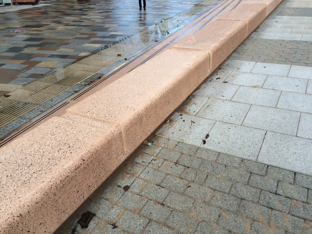 Bespoke Cast Concrete Ramp Wall Structure -  outside Frobisher House, Nelson Gate. Southampton Station Quarter North. Project. Image: Christopher Tipping