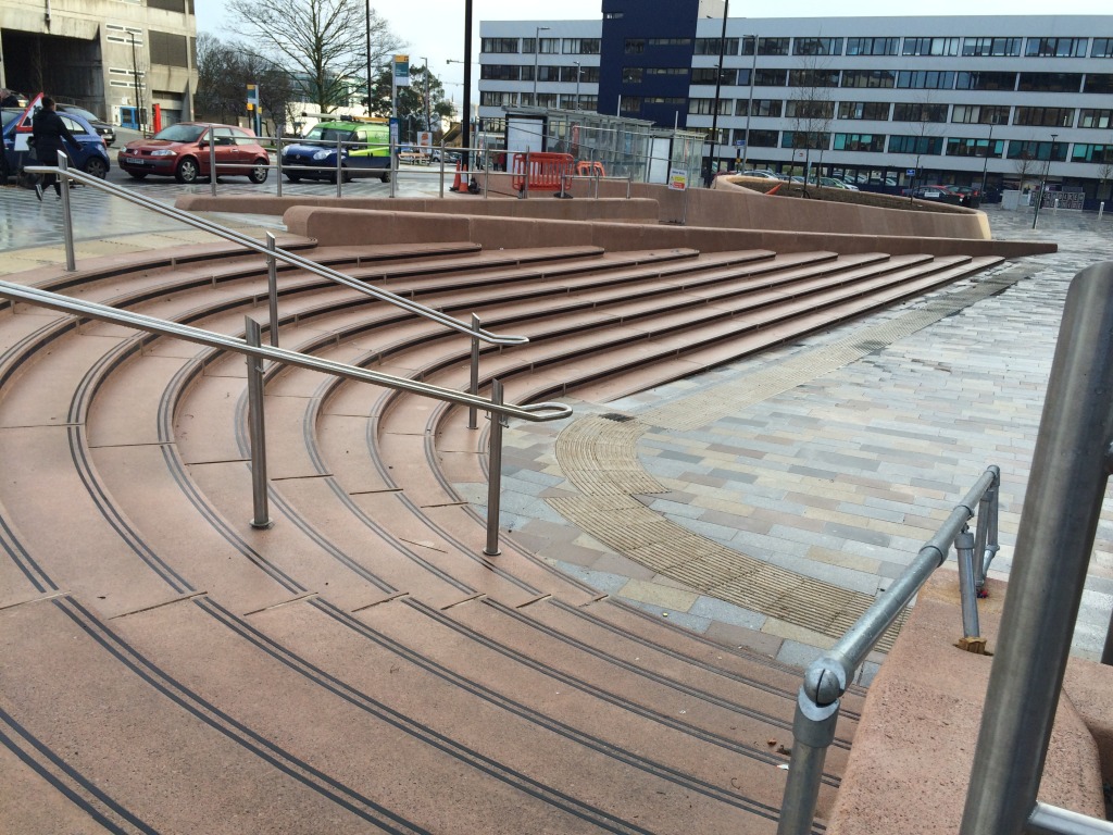 Bespoke Cast Concrete Amphitheatre Steps & Granite Paving outside Marco's Caffexpresso, Nelson Gate. Southampton Station Quarter North. Image: Christopher Tipping