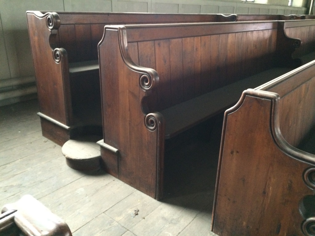 Interior of St John's Church, Railway Street, Chatham. A view of benches on the upper balcony. Image: Christopher Tipping by permission Diocese of Rochester. 