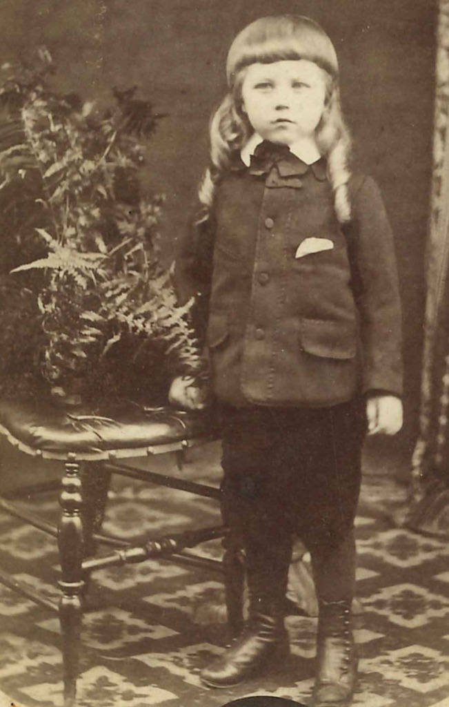 Photographic portrait of a young boy taken by W Kent, Photographic Artist at No 19 Military Road, Chatham - in the collection of  Guildhall Museum, Rochester. Image reproduced courtesy of the Guildhall Museum, Rochester. 